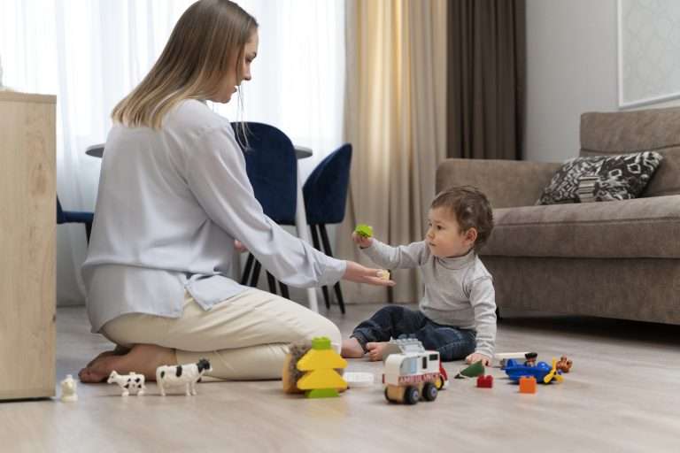 mother kid playing with toys full shot scaled